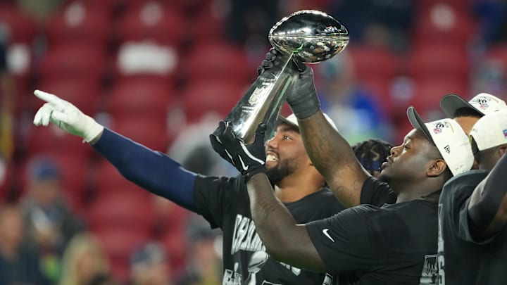 Feb 8, 2026; Santa Clara, CA, USA;  Seattle Seahawks players celebrate with the Vince Lombardi Trophy after defeating the New England Patriots in Super Bowl LX at Levi's Stadium. Mandatory Credit: Kirby Lee-Imagn Images