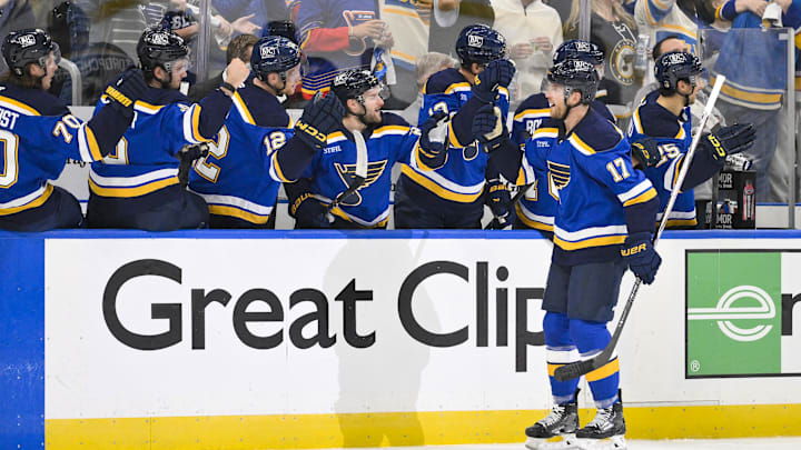 Apr 24, 2025; St. Louis, Missouri, USA; St. Louis Blues defenseman Cam Fowler (17) is congratulated by teammates after scoring against the Winnipeg Jets during the first period in game three of the first round of the 2025 Stanley Cup Playoffs at Enterprise Center. Mandatory Credit: Jeff Curry-Imagn Images