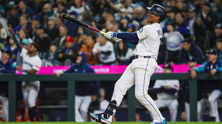 Seattle Mariners third baseman Jorge Polanco hits a two-run home run against the Athletics on March 27 at T-Mobile Park.