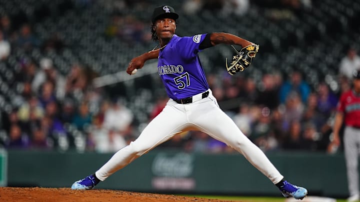 Denver, Colorado, USA; Colorado Rockies relief pitcher Angel Chivilli (57) delivers a pitch in the ninth inning against the Arizona Diamondbacks at Coors Field.