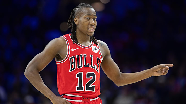 Jan 2, 2024; Philadelphia, Pennsylvania, USA; Chicago Bulls guard Ayo Dosunmu (12) reacts to a play against the Philadelphia 76ers during the second quarter at Wells Fargo Center. Mandatory Credit: Bill Streicher-Imagn Images