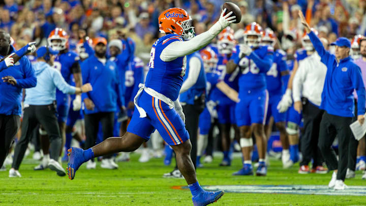 Florida Gators defensive tackle Caleb Banks celebrates recovering a fumble against Florida State.