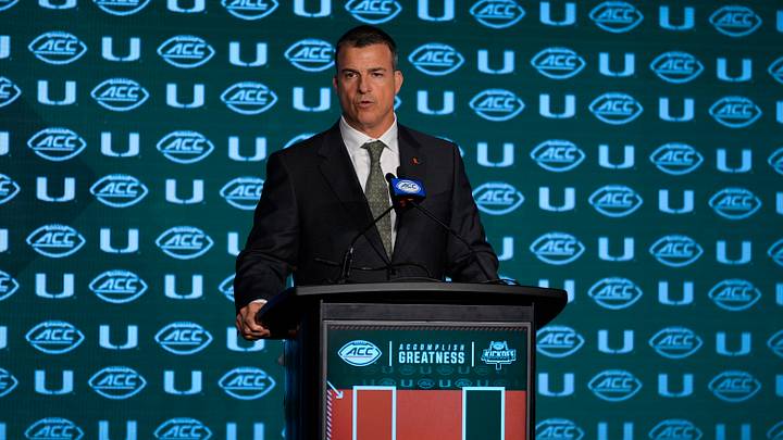 Jul 24, 2024; Charlotte, NC, USA;  Miami Hurricanes head coach Mario Cristobal speaks to the media during the ACC Kickoff at Hilton Charlotte Uptown. Mandatory Credit: Jim Dedmon-USA TODAY Sports