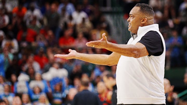 Jan 17, 2023; New Orleans, Louisiana, USA; Tulane Green Wave head coach Ron Hunter cheers at the crowd during the second half against the Houston Cougars at Avron B. Fogelman Arena in Devlin Fieldhouse.