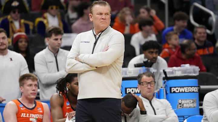 Mar 23, 2025; Milwaukee, WI, USA; Illinois Fighting Illini head coach Brad Underwood reacts during the first half in the second round of the NCAA Tournament against the Kentucky Wildcats at Fiserv Forum. Mandatory Credit: Jeff Hanisch-Imagn Images Mar 23, 2025; Milwaukee, WI, USA; Illinois Fighting Illini head coach Brad Underwood reacts during the first half in the second round of the NCAA Tournament against the Kentucky Wildcats at Fiserv Forum. Mandatory Credit: Jeff Hanisch-Imagn Images