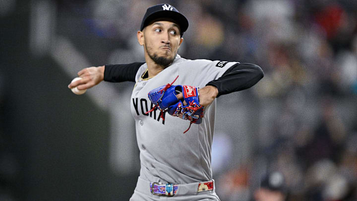Apr 29, 2026; Arlington, Texas, USA; New York Yankees starting pitcher Elmer Rodriguez (71) pitches against the Texas Rangers during the first inning at Globe Life Field. Mandatory Credit: Jerome Miron-Imagn Images