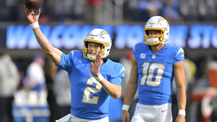 Dec 15, 2024; Inglewood, California, USA; Los Angeles Chargers quarterback Justin Herbert (10) looks on as quarterback Easton Stick (2) warms up prior to the game against the Tampa Bay Buccaneers at SoFi Stadium. Mandatory Credit: Jayne Kamin-Oncea-Imagn Images Dec 15, 2024; Inglewood, California, USA; Los Angeles Chargers quarterback Justin Herbert (10) looks on as quarterback Easton Stick (2) warms up prior to the game against the Tampa Bay Buccaneers at SoFi Stadium. Mandatory Credit: Jayne Kamin-Oncea-Imagn Images