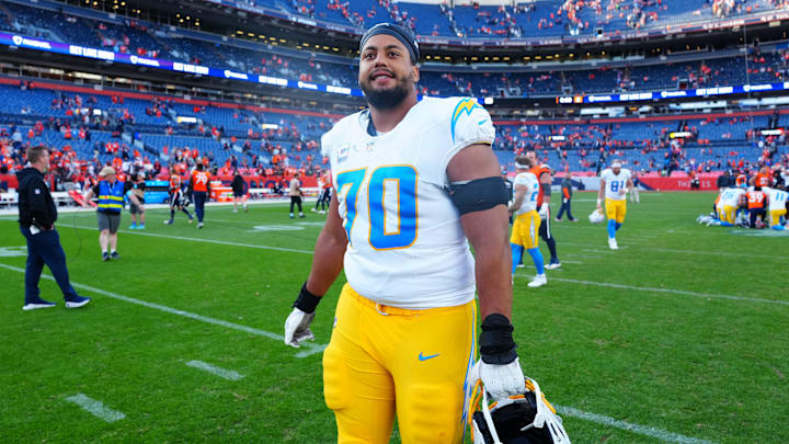 Oct 13, 2024; Denver, Colorado, USA; Los Angeles Chargers offensive tackle Rashawn Slater (70) following the win over the Denver Broncos at Empower Field at Mile High. Mandatory Credit: Ron Chenoy-Imagn Images
