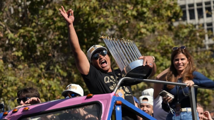 Nov 1, 2024; Los Angeles, CA, USA; Los Angeles Dodgers manager Dave Roberts (30) celebrates with the Commissioner’s Trophy during the 2024 World Series championship parade near Los Angeles City Hall. Mandatory Credit: Kirby Lee-Imagn Images Nov 1, 2024; Los Angeles, CA, USA; Los Angeles Dodgers manager Dave Roberts (30) celebrates with the Commissioner’s Trophy during the 2024 World Series championship parade near Los Angeles City Hall. Mandatory Credit: Kirby Lee-Imagn Images