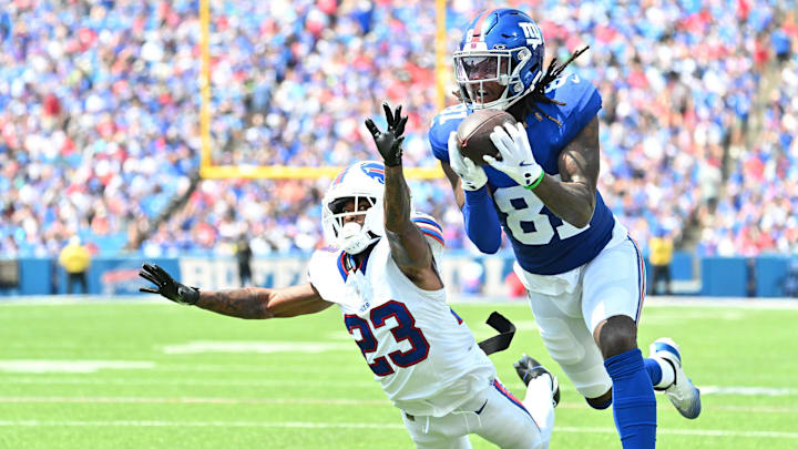 Aug 9, 2025; Orchard Park, New York, USA; New York Giants wide receiver Lil'Jordan Humphrey (81) catches a pass for a touchdown as Buffalo Bills cornerback Dane Jackson (23) defends