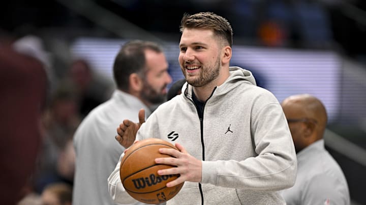 Dallas Mavericks guard Luka Doncic (77) looks on during a stoppage in play during the first half of the game between the Dallas Mavericks and the Minnesota Timberwolves at the American Airlines Center.