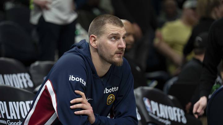 Apr 30, 2026; Minneapolis, Minnesota, USA; Denver Nuggets center Nikola Jokic (15) seats on the bench before the second half begins against the Minnesota Timberwolves during game six of the first round of the 2026 NBA Playoffs at Target Center.