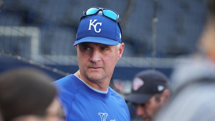 Oct 10, 2024; Kansas City, Missouri, USA; Kansas City Royals manager Matt Quatraro (33) during warmups before a game against the New York Yankees for game four of the ALDS for the 2024 MLB Playoffs at Kauffman Stadium. Mandatory Credit: Denny Medley-Imagn Images