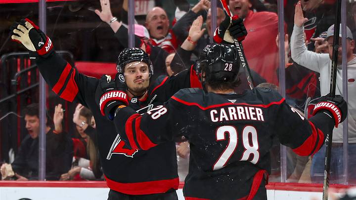 October 27, 2026: Carolina Hurricanes center Sebastian Aho (20) celebrates his go-ahead goal in the third period with teammate William Carrier (28) as the Hurricanes defeat the Boston Bruins, 2-1, at the Lenovo Center in Raleigh, North Carolina.