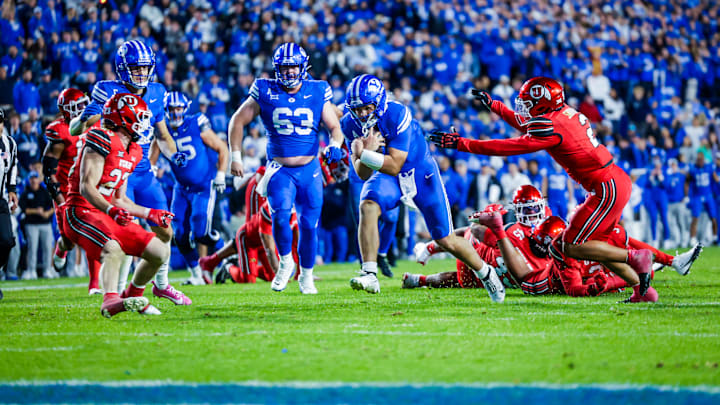 BYU quarterback Bear Bachmeier scores a touchdown against Utah