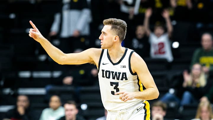 Iowa guard Jordan Bohannon (3) reacts after making a 3-point basket during a NCAA non-conference game