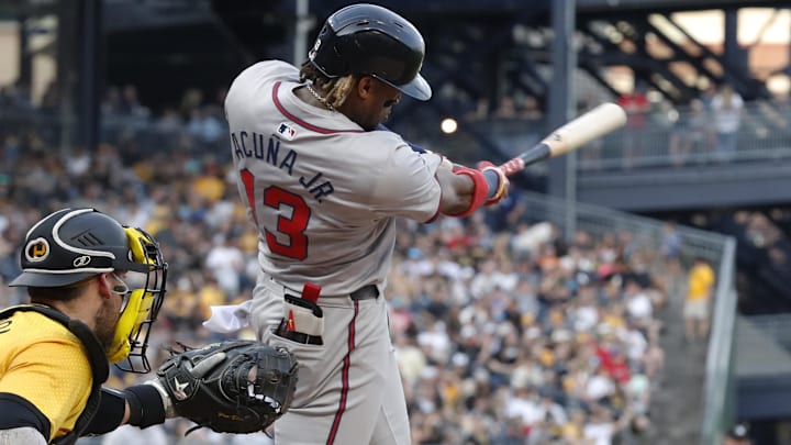  Atlanta Braves right fielder Ronald Acuna Jr. (13) hits a single against the Pittsburgh Pirates during the fourth inning at PNC Park.