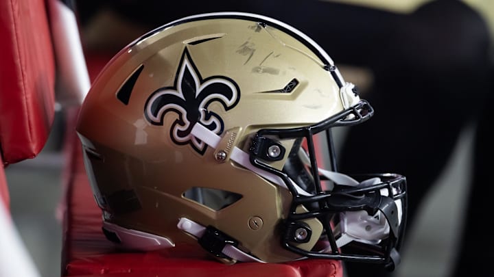 Aug 10, 2024; Glendale, Arizona, USA; Detailed view of a New Orleans Saints helmet during a preseason NFL game at State Farm Stadium. Mandatory Credit: Mark J. Rebilas-Imagn Images