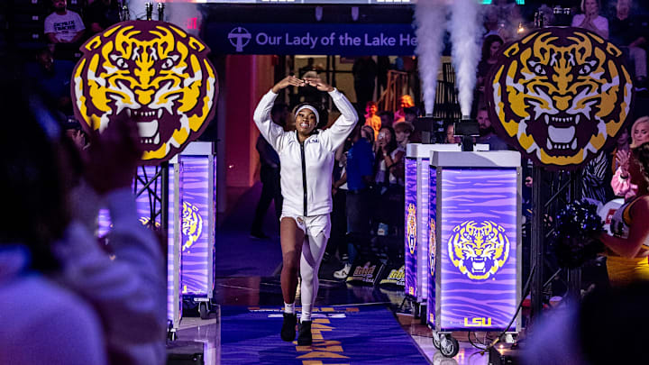 Nov 8, 2024; Baton Rouge, Louisiana, USA; LSU Lady Tigers guard Aneesah Morrow (24) announced to the crowd before a game against the Northwestern State Lady Demons at Pete Maravich Assembly Center. Mandatory Credit: Stephen Lew-Imagn Images Nov 8, 2024; Baton Rouge, Louisiana, USA; LSU Lady Tigers guard Aneesah Morrow (24) announced to the crowd before a game against the Northwestern State Lady Demons at Pete Maravich Assembly Center. Mandatory Credit: Stephen Lew-Imagn Images