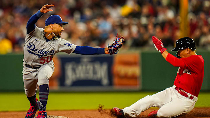 Aug 25, 2023; Boston, Massachusetts, USA; Los Angeles Dodgers right fielder Mookie Betts (50) makes the out at second base against the Boston Red Sox in the fifth inning at Fenway Park.