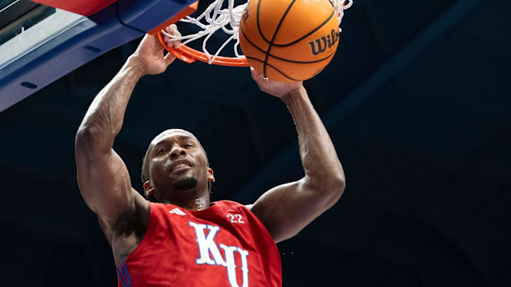 Kansas men's basketball's Darryn Peterson (22) dunks the ball during Late Night in the Phog, Friday, Oct. 17, 2025 at Allen Fieldhouse .