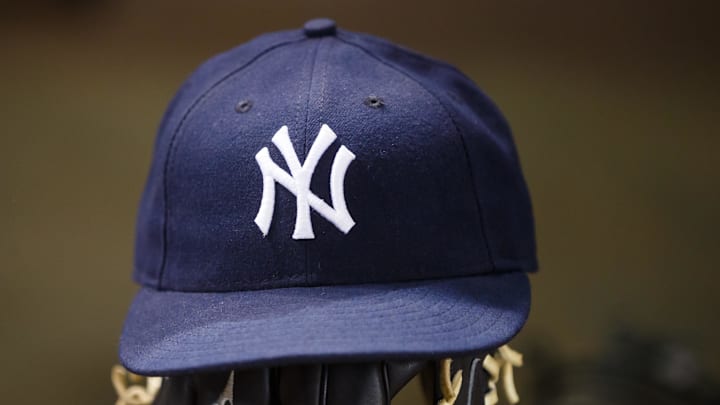May 18, 2016; Phoenix, AZ, USA; Detailed view of a New York Yankees hat and baseball glove against the Arizona Diamondbacks at Chase Field. Mandatory Credit: Mark J. Rebilas-Imagn Images May 18, 2016; Phoenix, AZ, USA; Detailed view of a New York Yankees hat and baseball glove against the Arizona Diamondbacks at Chase Field. Mandatory Credit: Mark J. Rebilas-Imagn Images