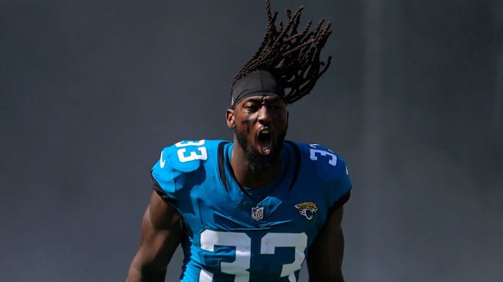 Jacksonville Jaguars linebacker Devin Lloyd (33) is introduced before an NFL football matchup Sunday, Oct. 27, 2024 at EverBank Stadium in Jacksonville, Fla. The Packers edged the Jaguars 30-27 on a last-second field goal. [Corey Perrine/Florida Times-Union]