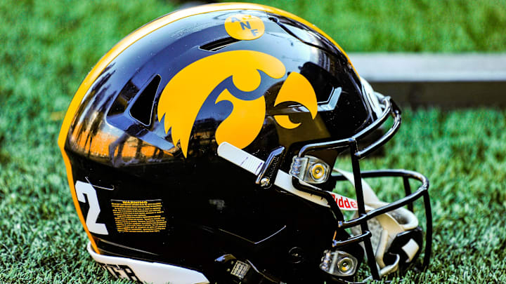Sep 18, 2021; Iowa City, Iowa, USA; A Hawkeye helmet sits on the sidelines during the game between the Iowa Hawkeyes and the Kent State Golden Flashes at Kinnick Stadium. Mandatory Credit: Jeffrey Becker-Imagn Images Sep 18, 2021; Iowa City, Iowa, USA; A Hawkeye helmet sits on the sidelines during the game between the Iowa Hawkeyes and the Kent State Golden Flashes at Kinnick Stadium. Mandatory Credit: Jeffrey Becker-Imagn Images