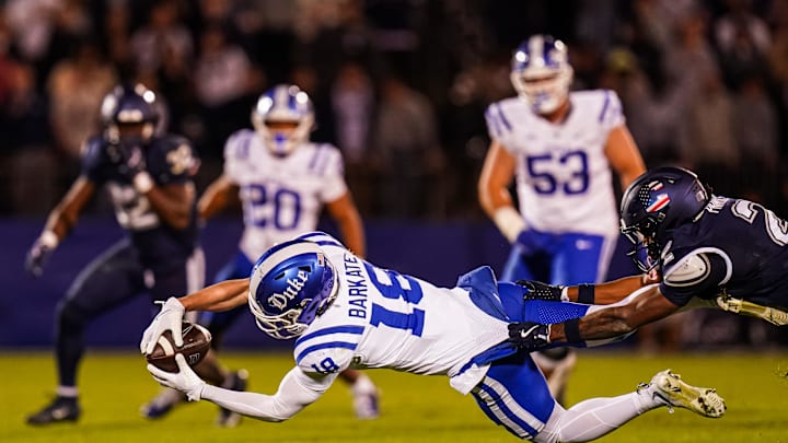 Nov 8, 2025; East Hartford, Connecticut, USA; Duke Blue Devils wide receiver Cooper Barkate (18) makes the catch against the UConn Huskies in the second half at Pratt & Whitney Stadium at Rentschler Field. Mandatory Credit: David Butler II-Imagn Images