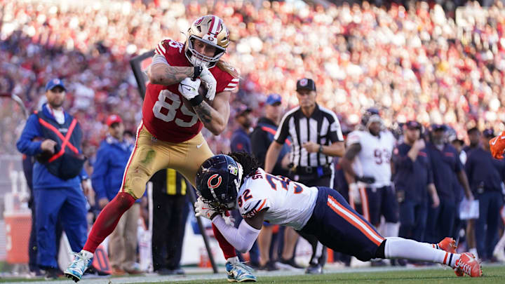 George Kittle hauls in a pass against the Bears. Kittle's health is in question for this week's game.