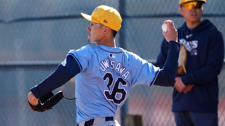 Feb 14, 2024; Port Charlotte, FL, USA;  Tampa Bay Rays pitcher Naoyuki Uwasawa (63) participates in