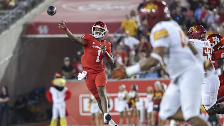 Houston Cougars quarterback Donovan Smith attempts a pass against the Iowa State Cyclones.