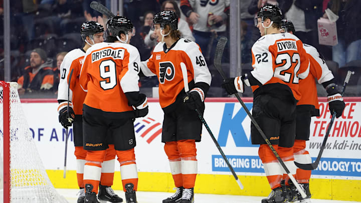 Jan 31, 2026; Philadelphia, Pennsylvania, USA; Philadelphia Flyers center Trevor Zegras (46) reacts with teammates after scoring a goal against the Los Angeles Kings in the second period at Xfinity Mobile Arena.