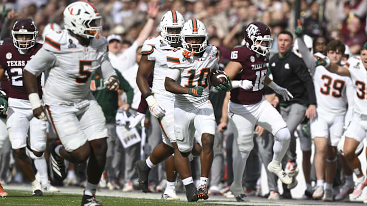 Dec 20, 2025; College Station, TX, USA; Miami Hurricanes wide receiver Malachi Toney (10) returns a punt against the Texas A&M Aggies during first half of the first round game of the CFP National Playoff at Kyle Field. Mandatory Credit: Maria Lysaker-Imagn Images Dec 20, 2025; College Station, TX, USA; Miami Hurricanes wide receiver Malachi Toney (10) returns a punt against the Texas A&M Aggies during first half of the first round game of the CFP National Playoff at Kyle Field. Mandatory Credit: Maria Lysaker-Imagn Images