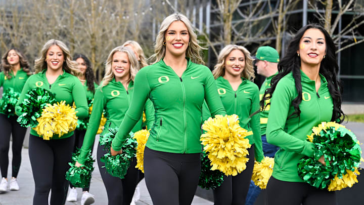 Dec 20, 2025; Eugene, OR, USA; Oregon Ducks cheerleaders look on before the game against the James Madison Dukes at Autzen Stadium. Mandatory Credit: Craig Strobeck-Imagn Images