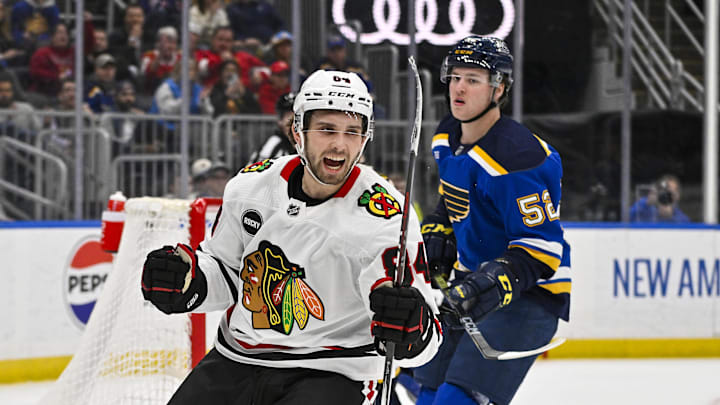 Apr 10, 2024; St. Louis, Missouri, USA;  Chicago Blackhawks left wing Landon Slaggert (84) reacts after scoring his first career NHL goal during the third period against the St. Louis Blues at Enterprise Center. Mandatory Credit: Jeff Curry-Imagn Images