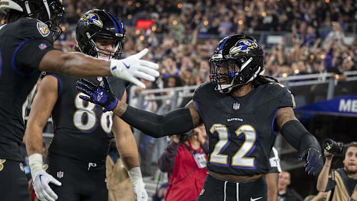 Sep 29, 2024; Baltimore, Maryland, USA;  Baltimore Ravens running back Derrick Henry (22) celebrates with teammates after scoring during the second quarter against the Buffalo Bills at M&T Bank Stadium. Mandatory Credit: Tommy Gilligan-Imagn Images