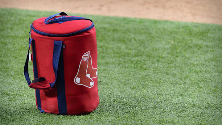 Apr 29, 2021; Arlington, Texas, USA; A view of the Boston Red Sox logo and a field bag during batting practice before the game between the Texas Rangers and the Boston Red Sox at Globe Life Field. Mandatory Credit: Jerome Miron-Imagn Images Apr 29, 2021; Arlington, Texas, USA; A view of the Boston Red Sox logo and a field bag during batting practice before the game between the Texas Rangers and the Boston Red Sox at Globe Life Field. Mandatory Credit: Jerome Miron-Imagn Images
