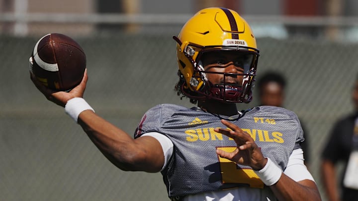 ASU quarterback Jaden Rashada throws a pass during a spring practice at the Kajikawa practice fields in Tempe on April 16, 2024. ASU quarterback Jaden Rashada throws a pass during a spring practice at the Kajikawa practice fields in Tempe on April 16, 2024.