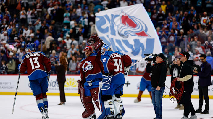 Feb 4, 2026; Denver, Colorado, USA; Colorado Avalanche goaltender MacKenzie Blackwood (39) celebrates with goaltender Scott Wedgewood (41) after the game against the San Jose Sharks at Ball Arena. Mandatory Credit: Isaiah J. Downing-Imagn Images