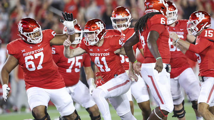 Houston Cougars place kicker Jack Martin (41) reacts after kicking a field goal with time expiring in the fourth quarter to give the Cougars a win over Utah Utes at TDECU Stadium. Houston Cougars place kicker Jack Martin (41) reacts after kicking a field goal with time expiring in the fourth quarter to give the Cougars a win over Utah Utes at TDECU Stadium.