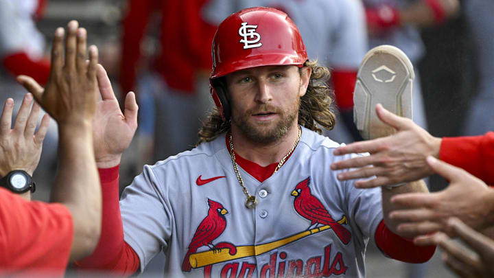 Jun 17, 2025; Chicago, Illinois, USA;  St. Louis Cardinals second baseman Brendan Donovan (33) celebrates in the dugout after he scores during the second inning against the Chicago White Sox at Rate Field. Mandatory Credit: Matt Marton-Imagn Images