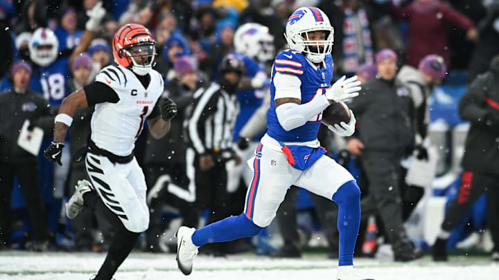 Dec 7, 2025; Orchard Park, New York, USA;  Buffalo Bills cornerback Christian Benford (47) runs the ball for a touchdown after an interception against the Cincinnati Bengals in the fourth quarter at Highmark Stadium. Mandatory Credit: Mark Konezny-Imagn Images