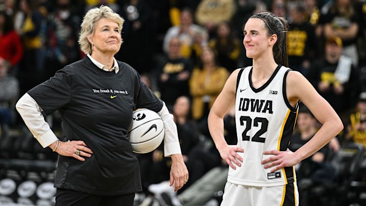 Feb 15, 2024; Iowa City, Iowa, USA; Iowa Hawkeyes guard Caitlin Clark (22) reacts with head coach Lisa Bluder after the game at Carver-Hawkeye Arena against the Michigan Wolverines. During the game Clark would break the NCAA women's all-time scoring record. Mandatory Credit: Jeffrey Becker-Imagn Images Feb 15, 2024; Iowa City, Iowa, USA; Iowa Hawkeyes guard Caitlin Clark (22) reacts with head coach Lisa Bluder after the game at Carver-Hawkeye Arena against the Michigan Wolverines. During the game Clark would break the NCAA women's all-time scoring record. Mandatory Credit: Jeffrey Becker-Imagn Images