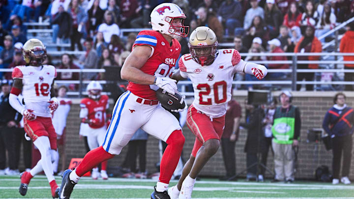 Nov 8, 2025; Chestnut Hill, Massachusetts, USA; Southern Methodist University Mustangs tight end Matthew Hibner (88) runs for a touchdown against Boston College Eagles defensive back Marcus Upton (20) during the second half at Alumni Stadium. Mandatory Credit: Eric Canha-Imagn Images Nov 8, 2025; Chestnut Hill, Massachusetts, USA; Southern Methodist University Mustangs tight end Matthew Hibner (88) runs for a touchdown against Boston College Eagles defensive back Marcus Upton (20) during the second half at Alumni Stadium. Mandatory Credit: Eric Canha-Imagn Images