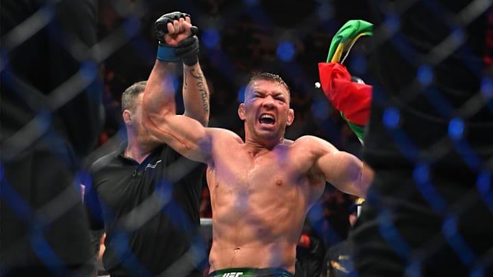 Jan 20, 2024; Toronto, Canada, USA; Dricus Du Plessis (blue gloves) celebrates defeating Sean Strickland (red glove) during UFC 297 at ScotiaBank Arena. Mandatory Credit: Dan Hamilton-Imagn Images Jan 20, 2024; Toronto, Canada, USA; Dricus Du Plessis (blue gloves) celebrates defeating Sean Strickland (red glove) during UFC 297 at ScotiaBank Arena. Mandatory Credit: Dan Hamilton-Imagn Images
