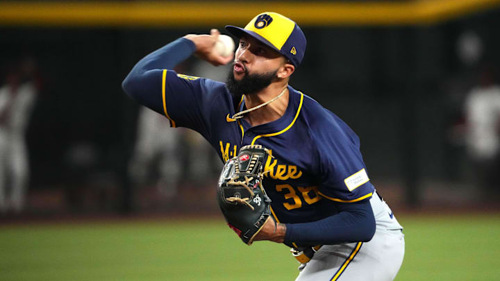 Sep 13, 2024; Phoenix, Arizona, USA; Milwaukee Brewers pitcher Devin Williams (38) pitches against the Arizona Diamondbacks during the ninth inning at Chase Field. Sep 13, 2024; Phoenix, Arizona, USA; Milwaukee Brewers pitcher Devin Williams (38) pitches against the Arizona Diamondbacks during the ninth inning at Chase Field.