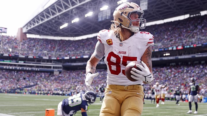 Sep 7, 2025; Seattle, Washington, USA; San Francisco 49ers tight end George Kittle (85) celebrates after scoring a touchdown during the first half against the Seattle Seahawks during the first quarter at Lumen Field. Mandatory Credit: Joe Nicholson-Imagn Images