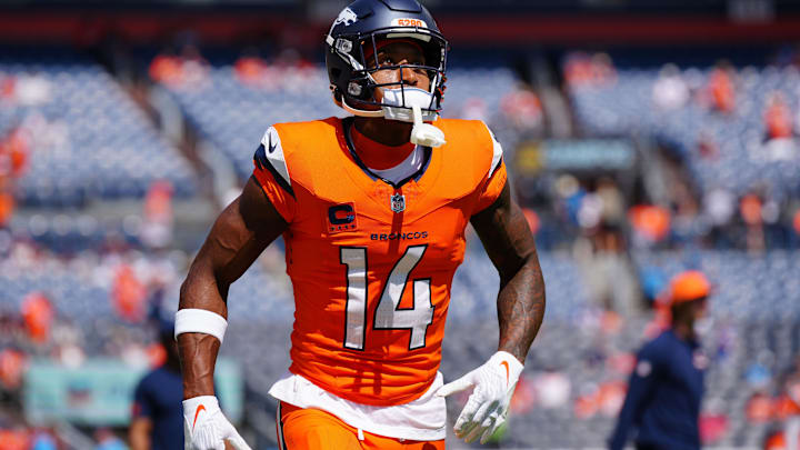 Sep 7, 2025; Denver, Colorado, USA; Denver Broncos wide receiver Courtland Sutton (14) practices before the game at Empower Field at Mile High. Mandatory Credit: Ron Chenoy-Imagn Images