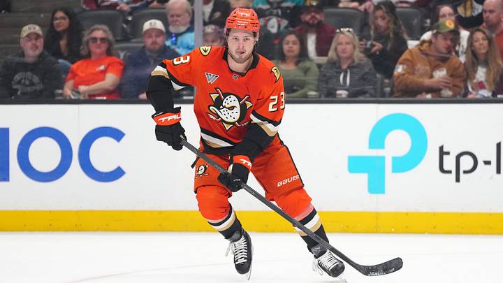 Apr 13, 2025; Anaheim, California, USA; Anaheim Ducks center Mason McTavish (23) skates with the puck against the Colorado Avalanche in the first period at Honda Center. Mandatory Credit: Kirby Lee-Imagn Images